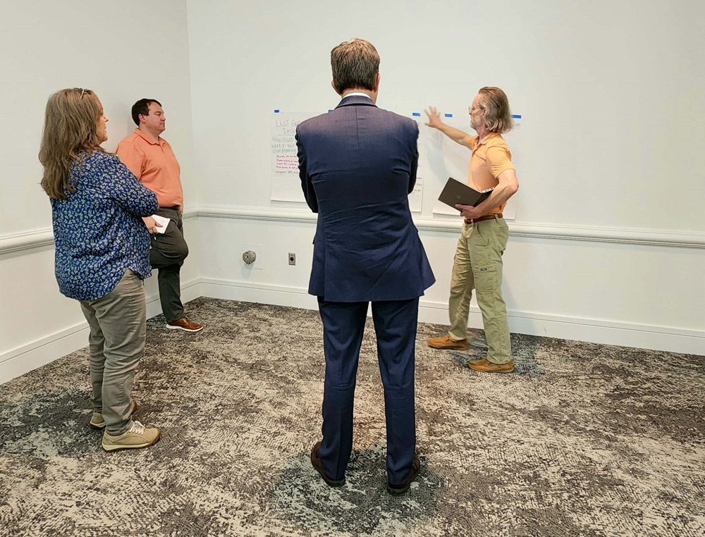 Members of Laboratory Leaders of Today Cohort 2 discuss in a small group at their in-person meeting prior to the 2024 APHL Annual Conference.