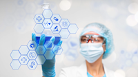 scientist holds up beaker with blue liquid, overlaid with icons associated with science and healthcare