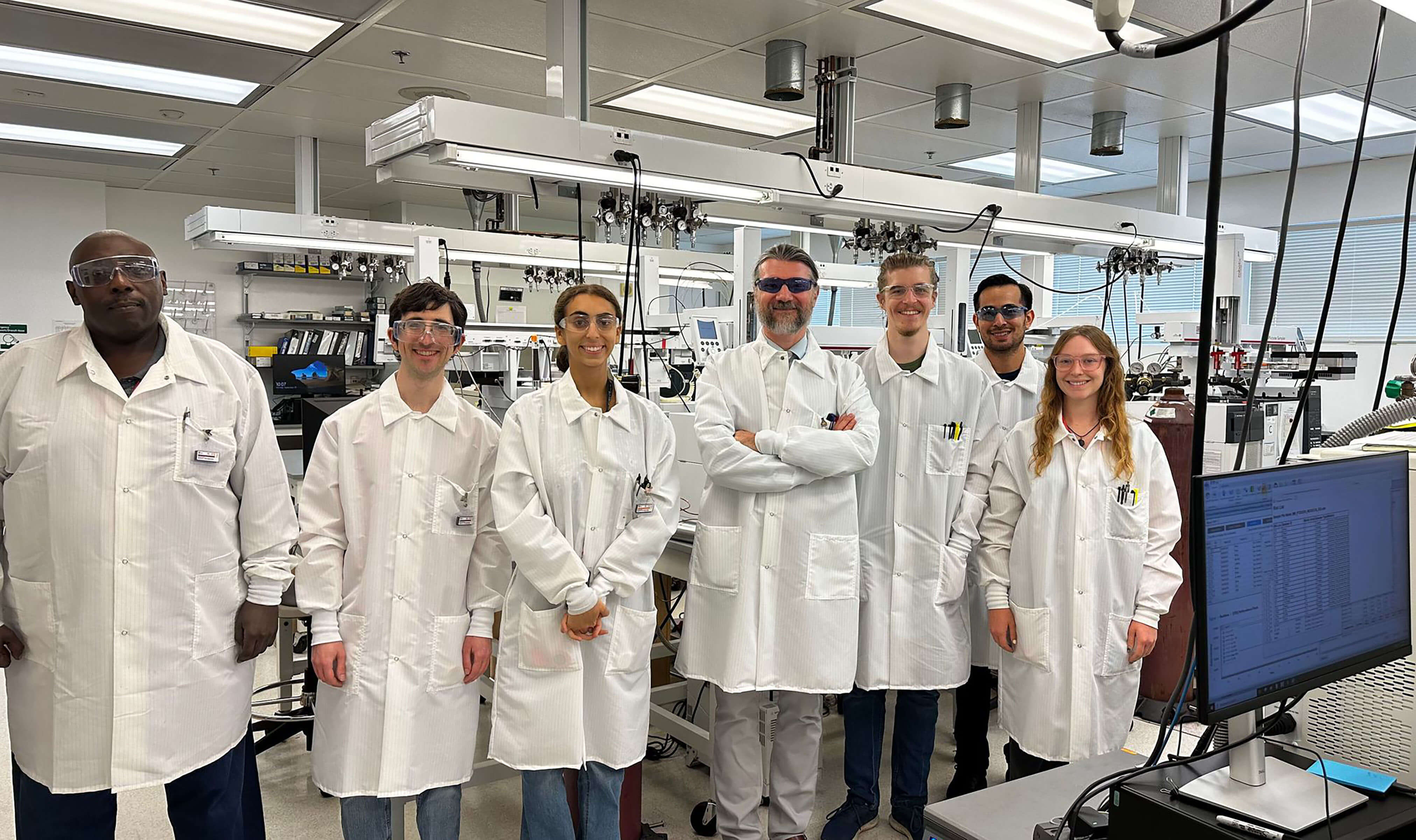 Dr. Sin Urban with a group of fellows and interns at Maryland Department of Health Laboratories Administration