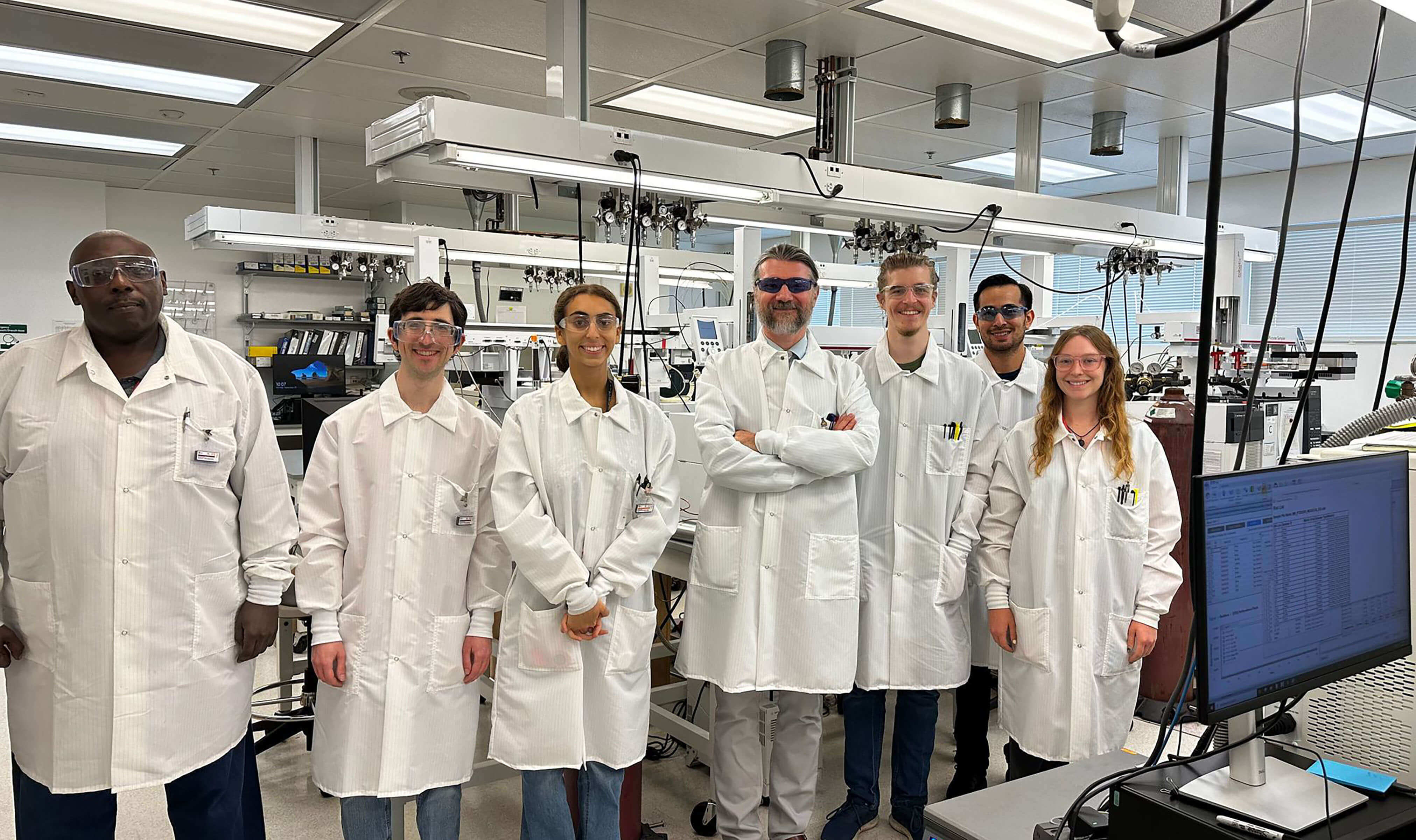 Dr. Sin Urban with a group of fellows and interns at Maryland Department of Health Laboratories Administration