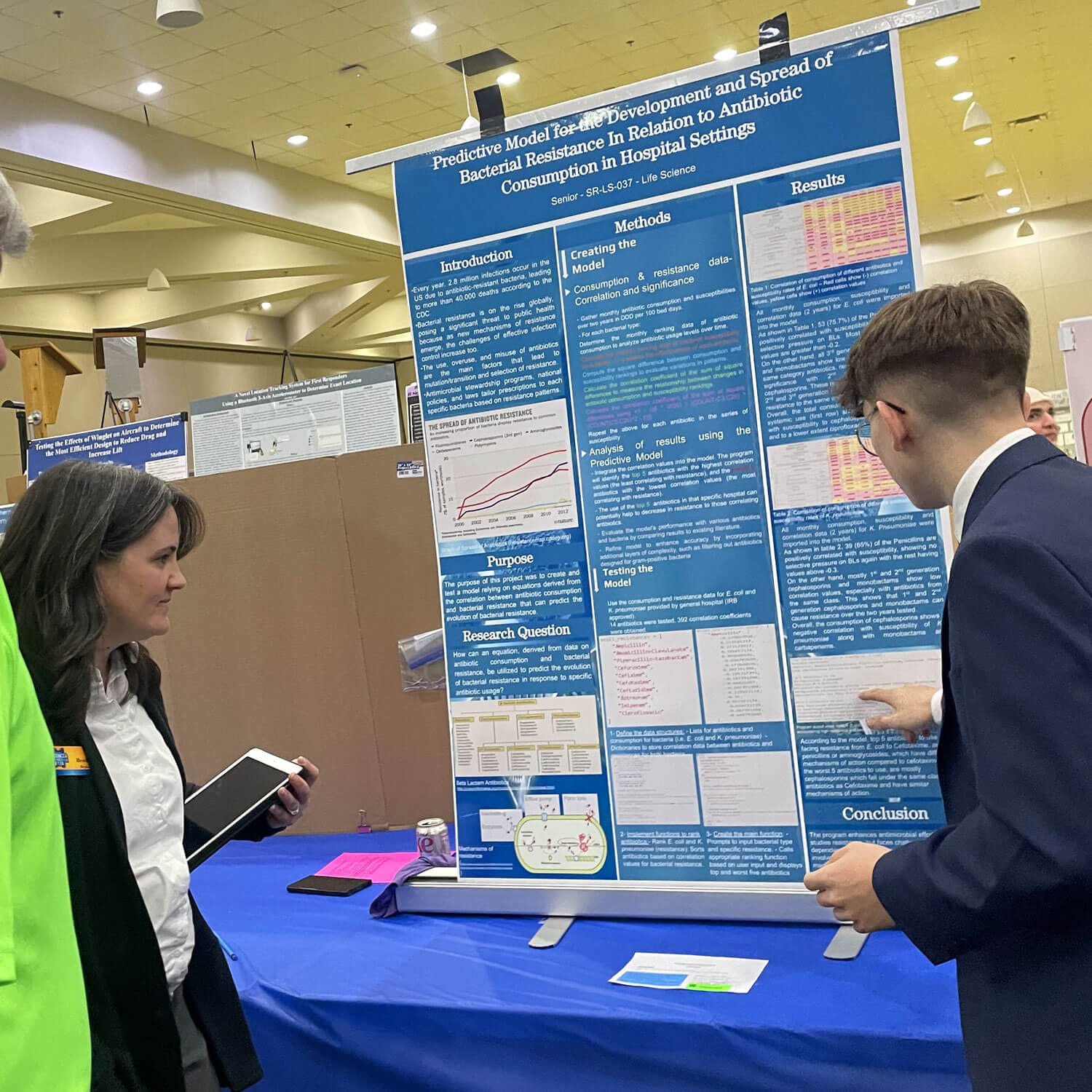 Public Health Laboratory Ambassador Heather Seymour attends an outreach event at a science fair. Photo: Flint Regional Science and Engineering Fair.