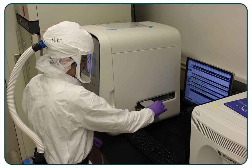 LMspring2026_20-PHPR-Value-of-PHEP-Funding_FULL Michael J. Perry, DrPH, MEd, director of the Biodefense Laboratory at the Wadsworth Center, loads a polymerase chain reaction plate into a QuantStudio™ Dx instrument to prep for LRN-B testing.